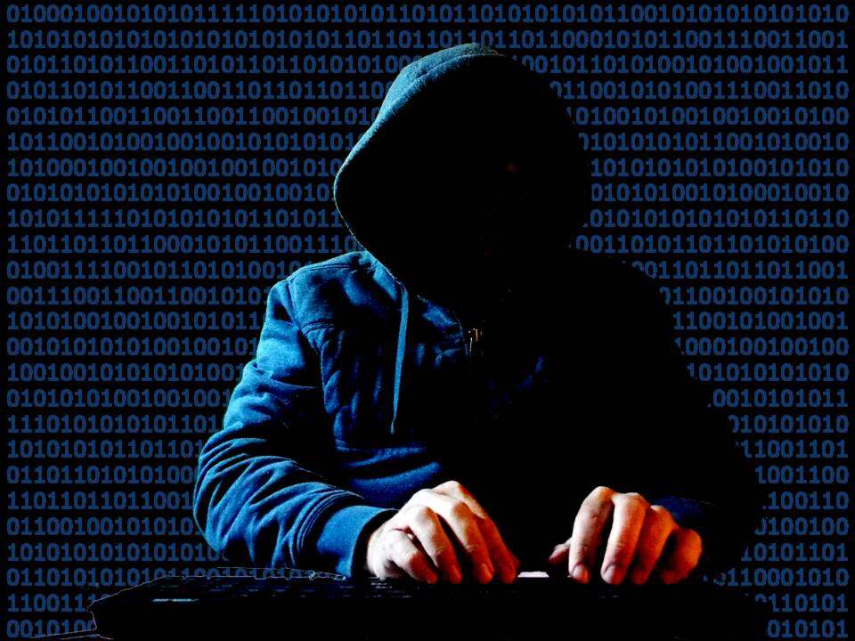 ハッカーとバイナリコードのイメージ写真